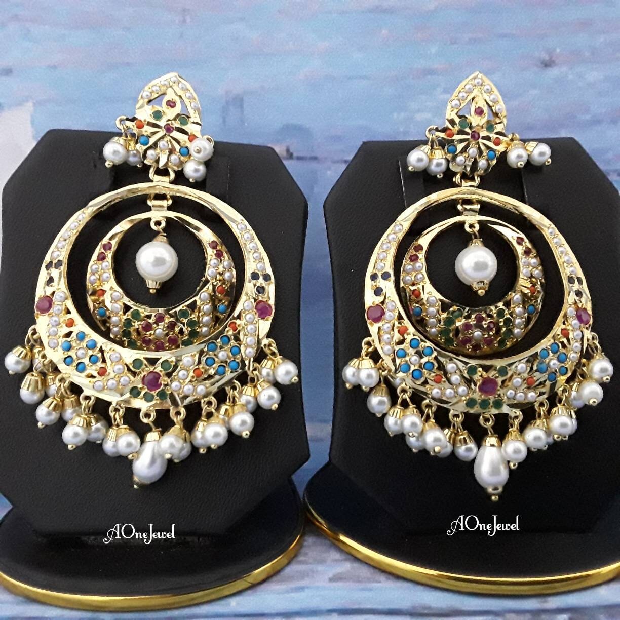 Latest selling Collection, Indian Jadau Naurathan Jewelry set, Golden indian jewelry set, Jhumki, indian jewelry, hydrabadi jewelry.